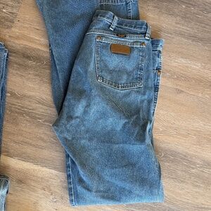 Cowboy used wranglers tall and thin